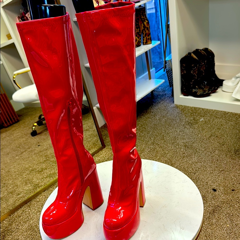 Glossy Red Heeled Boots with High Heel and Knee-High Design